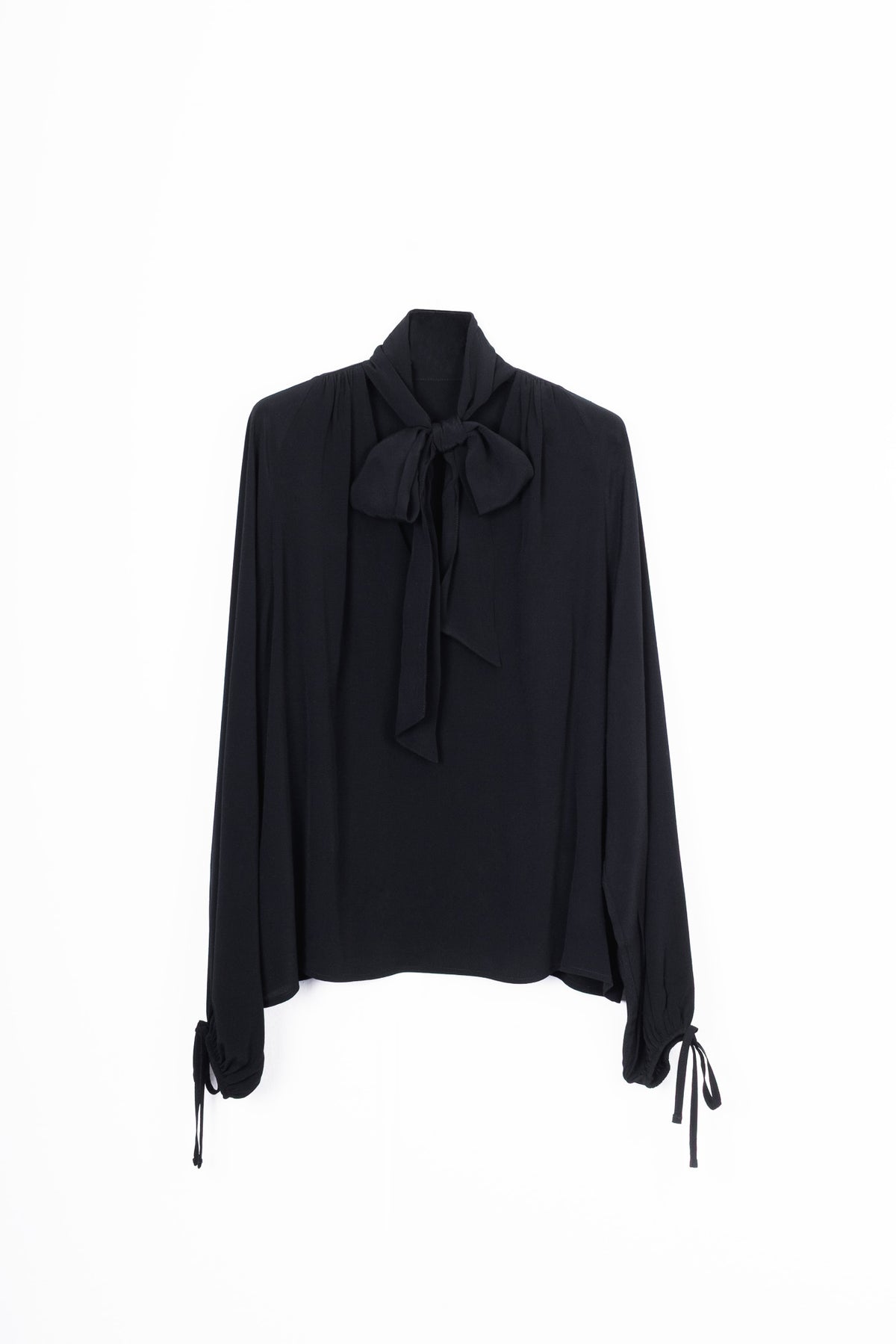 Blusa con Fiocco