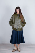 Giacca con cappuccio in similpelle